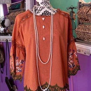 Pretty top with great details NWT